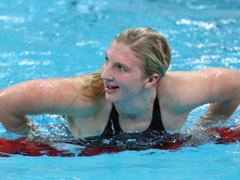 Great Britain's Rebecca Adlington celebrates winning heat 4 of the women's 800m freestyle swimming heats in an olympic record time of 8:18.06.