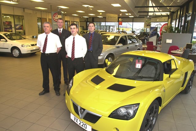 The Saville Street sales staff LtoR,  Paul Dunning, Craig Shipley, Colin Staples,  and  New Car Sales manager Jamie Selby pictured in 2002