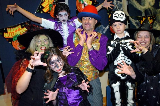 Pictured, left to right, Red Witch Pauline, Lavinia Turner, Ryan Turner, Barney Baloney, Luke Turner and Lynne Wilcox,  at the Halloween Disco at Charnock Hall Primary School, Sheffield, October 31, 2006