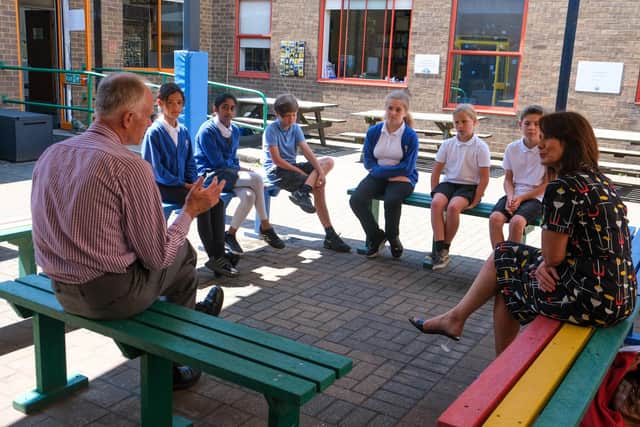 Pupils at Bradway Primary chat with headteacher Paul Stockley and Cllr Jayne Dunn about philosophy for children and its role in education
