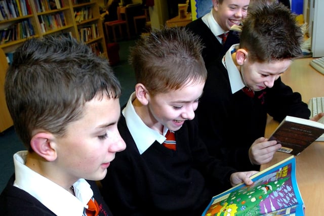 Edenthorpe Hungerhill School pupils from left, Nick Ward, Matthew Holmes, both aged 13, Ashley Hirst, Lewis Spencer and Jordan Lee, all aged 14 reading in 2007 on World Book Day