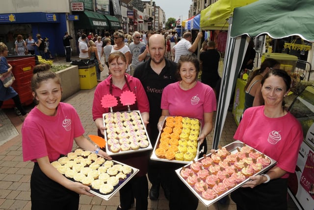 The 2014 Southsea Food Festival. 'Sweet Cakes by Barnesy' - (left to right) Rebecca Barnes (15), Alison Barnes (47), Chris Barnes (42), Amelia Owen (17), and Anna Gould (43). Picture: Malcolm Wells 142126-9946