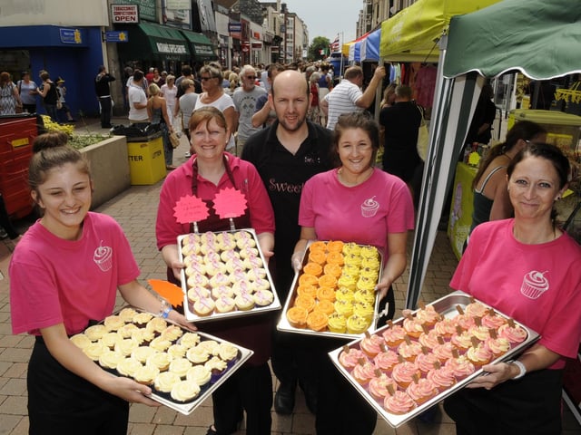 The 2014 Southsea Food Festival. 'Sweet Cakes by Barnesy' - (left to right) Rebecca Barnes (15), Alison Barnes (47), Chris Barnes (42), Amelia Owen (17), and Anna Gould (43). Picture: Malcolm Wells 142126-9946