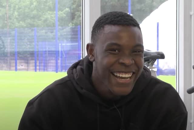 Fisayo 'Fizz' Dele-Bashiru is all smiles after joining Sheffield Wednesday. (via SWFC's official YouTube channel)