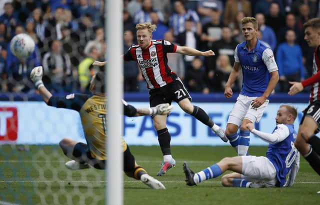 Mark Duffy of Sheffield United puts his side 3-2 up against Wednesday at Hillsborough: Simon Bellis/Sportimage