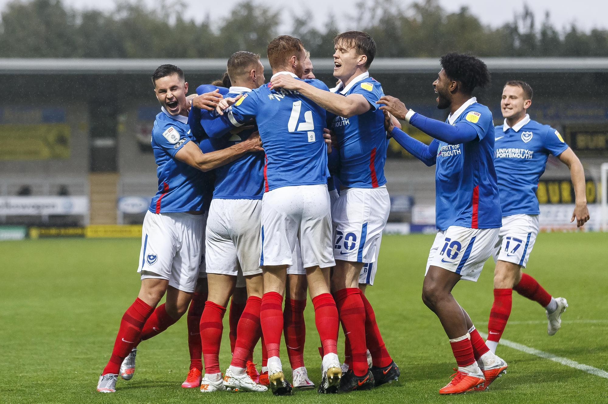 Pompey celebrate Jack Whatmough's goal at Burton. Picture: Daniel Chesterton