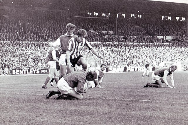 More action from the Sheffield derby at the Lane in October 1970.
