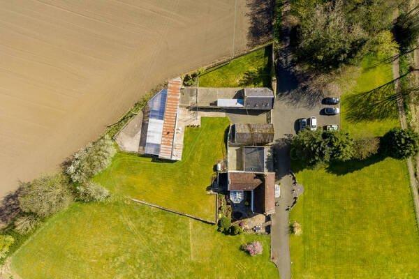 House and outbuildings from above.