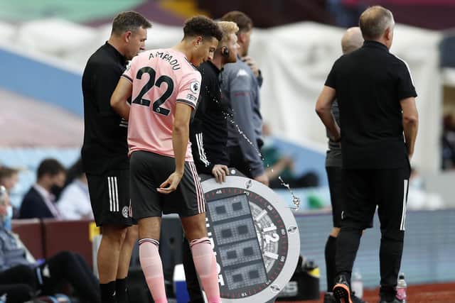 Ethan Ampadu of Sheffield United prepares to come on as a substitute during the Premier League match at Villa Park - Darren Staples/Sportimage