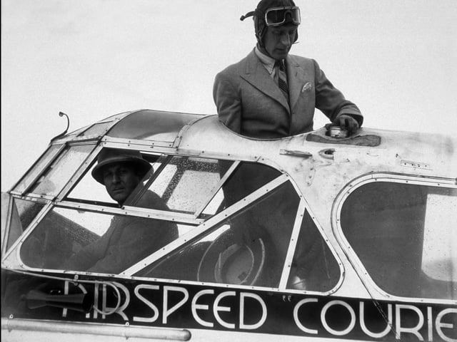 20th September 1934:  Squadron Leader Helmore operating the re-fuelling lock of his Air-Speed Courier, in which he and Sir Alan Cobham (1894 - 1973), flew to India from Portsmouth.  (Photo by Central Press/Getty Images)