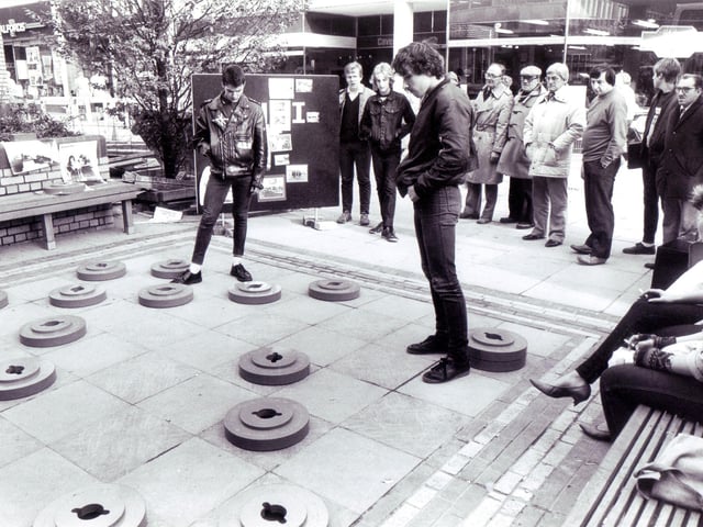 Enjoying a game of giant draughts on The Moor, Sheffield, in 1983