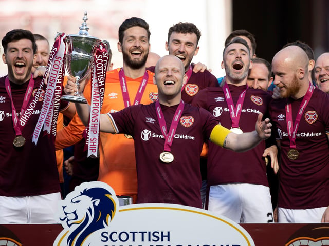 Hearts' captain Steven Naismith lifts the Championship trophy during a Scottish Championship to celebrate the Tynecastle's club return to the top tier.