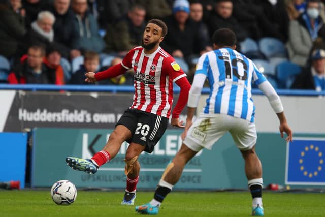 Jayden Bogle played with tape on his knee for Sheffield United against Huddersfield Town: Simon Bellis / Sportimage