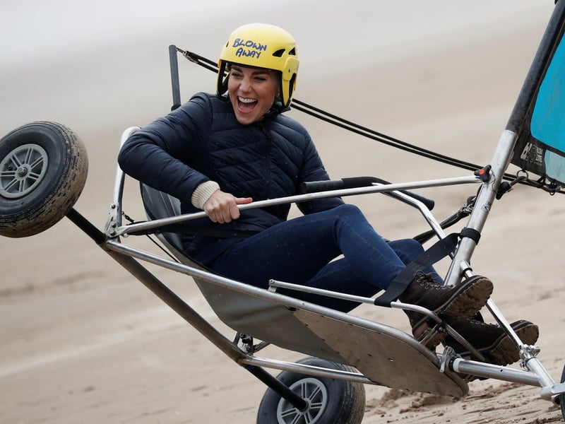 Prince William and Kate were pictured having a great time on St Andrews beach land yachting during their visit to the city where they first met 20 years ago.