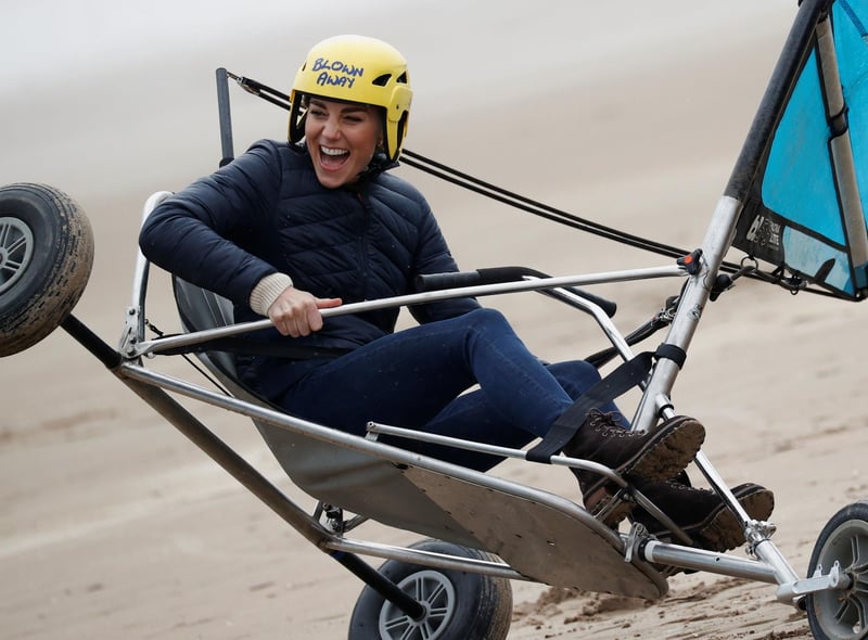 Prince William and Kate were pictured having a great time on St Andrews beach land yachting during their visit to the city where they first met 20 years ago.