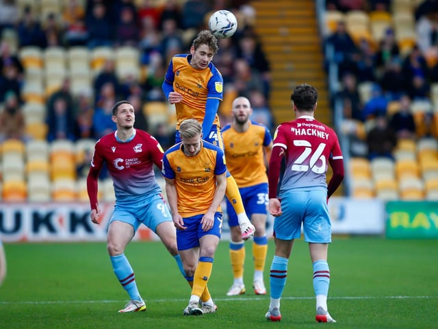 Mansfield Town defender Elliott Hewitt wins the header during the Sky Bet League 2 match against Scunthorpe Utd FC at the One Call Stadium
Photo credit should read : Chris Holloway / The Bigger Picture.media