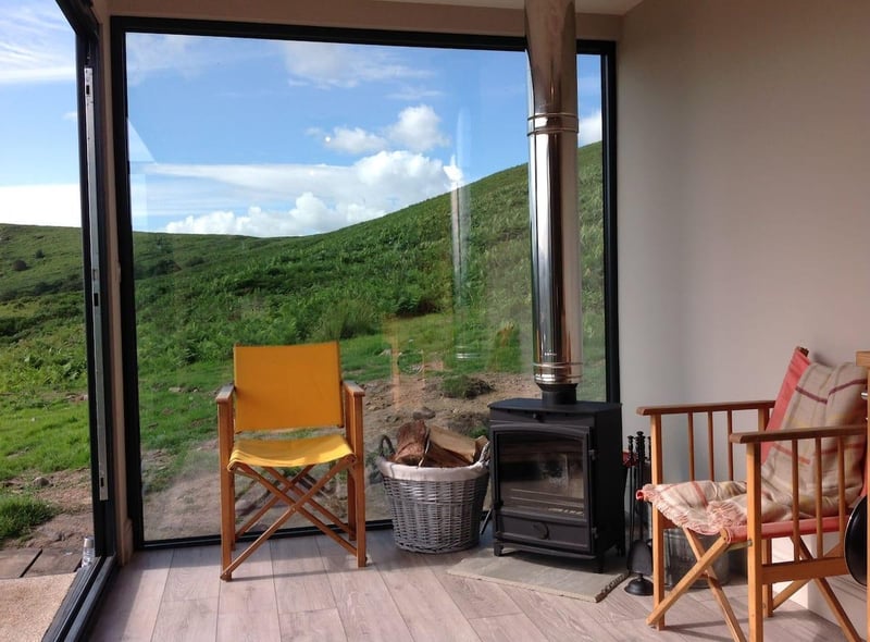This is the perfect spot to head out walking in the moors or to simply relax next to the roaring fire, watch the sunset, and gaze up at the stars. It's completely off-grid and powered by solar and water comes from a nearby hill spring.