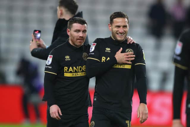 Billy Sharp (R) and John Fleck of Sheffield United react at the final whistle during the Sky Bet Championship match at the Stadium Of Light, Sunderland: Simon Bellis / Sportimage