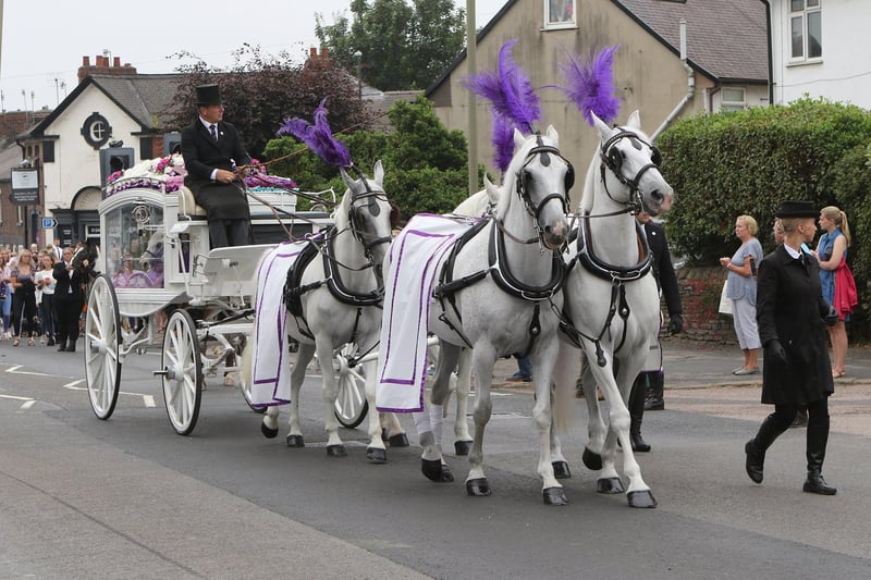 The procession passes along Sheffield Road. Gracie was a passionate equestrian and her final journey was by a beautiful horse-drawn carriage.