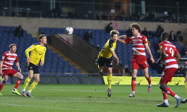 Joe Wright heads goalward against Oxford. Picture: Gareth Williams/AHPIX