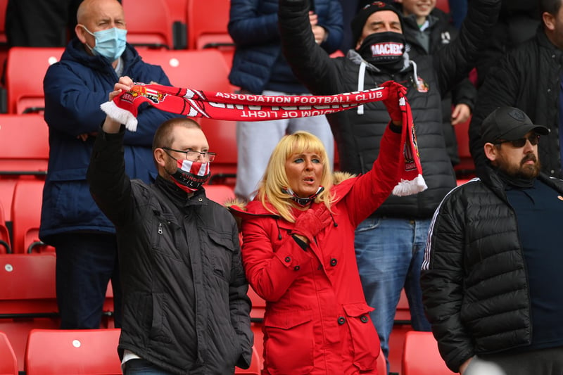 Sunderland fans enjoy the atmosphere with a scarf!