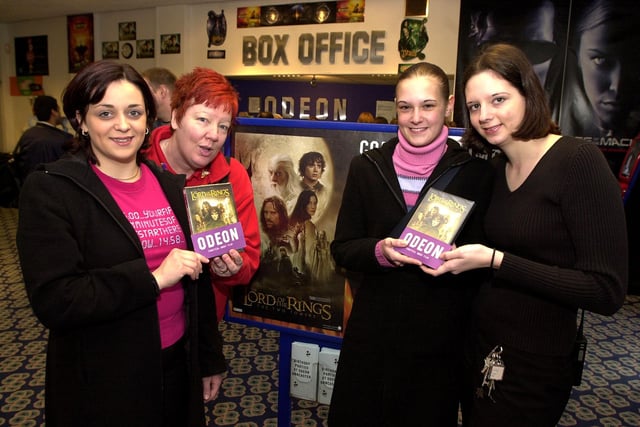 In 2002 Doncaster Odeon assistant manager Sonia Pollard (right) and Carcroft Asda's Grace Curtis (second left) presented  Melanie Meads, aged 18, of Bentley, and Louise Merryweather, of Carcroft, with their prizes: A Lord of the Rings dvd each and family tickets to go watch the latest Lord of the Rings, The Two Towers.