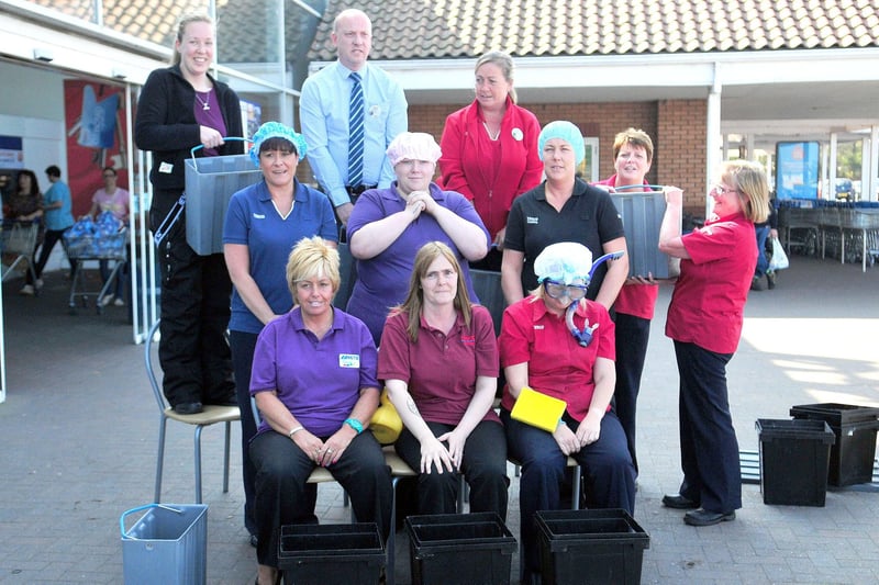 Tesco Extra staff Burn Road waiting to do their Ice Bucket Challenge in 2014. Are you pictured?