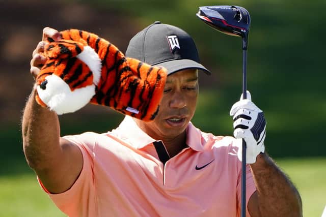 Tiger Woods prepares to hit on the driving range while practicing before the Masters golf tournament in Augusta: P Photo/Matt Slocum