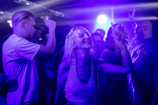 LONDON, ENGLAND - JULY 19: People dancing at Egg London nightclub in the early hours of July 19, 2021 in London, England. As of 12:01 on Monday, July 19, England will drop most of its remaining Covid-19 social restrictions, such as those requiring indoor mask-wearing and limits on group gatherings, among other rules. These changes come despite rising infections, pitting the country's vaccination programme against the virus's more contagious Delta variant. (Photo by Rob Pinney/Getty Images)