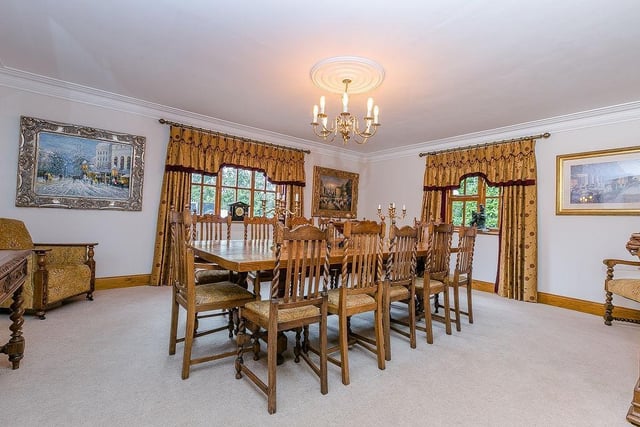 A set of double doors leads to this grand, double-aspect dining-room. It is an excellent place to seat up to 18 people.