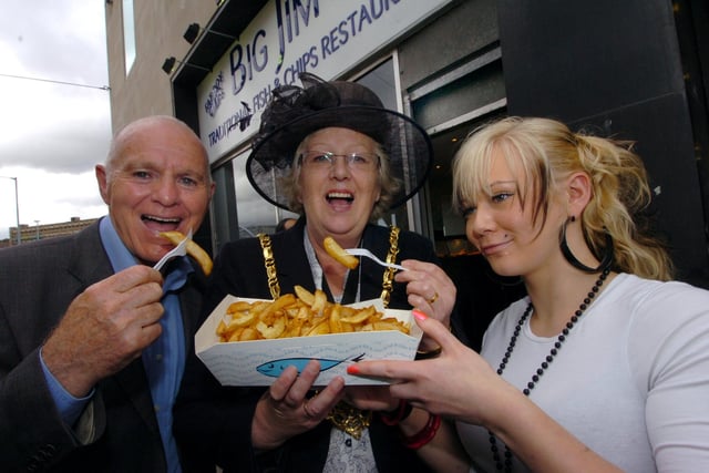 Boxing trainer Brendan Ingle and Lord Mayor Coun Jane Bird share a bag of chips, assisted by waitress Emma Hollowood, as they open the Big Jim's Fish & Chips restaurant, Commercial Street, Sheffield on July 18, 2008