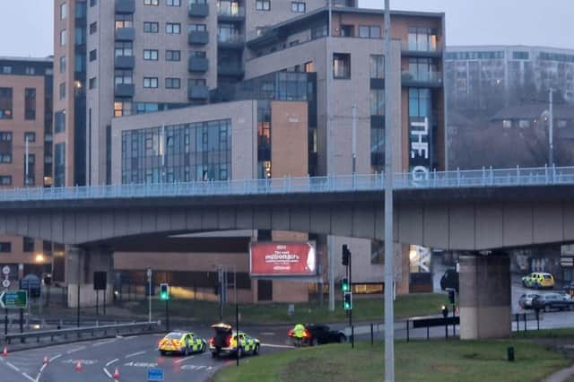 Police on Park Square roundabout during an incident at The Gateway flats in Sheffield city centre. February 11 2025.