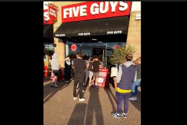 It is claimed some people queued for two hours for food outside Five Guys on the Centertainment complex in Sheffield yesterday