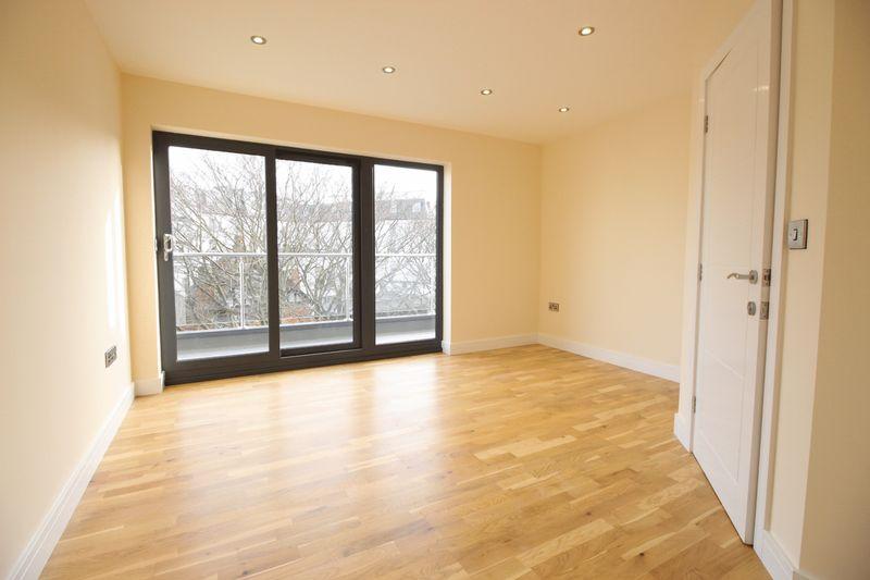 With ensuite and sliding door access onto the balcony.