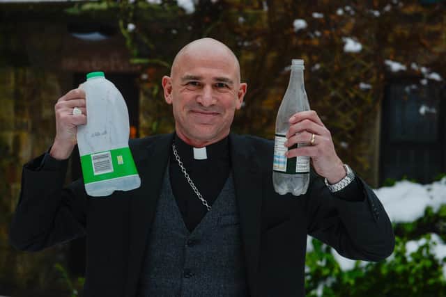Bishop of Sheffield, The right Reverand Pete Wilcox with his plastic recycling box at his residence in Sheffield