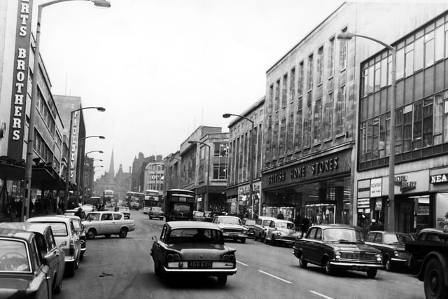 The Moor, in Sheffield city centre, showing Robert Brothers Department Store, Rockingham House, British Home Stores and Pauldens, in February 1966