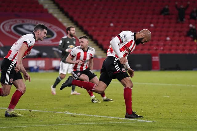 David McGoldrick of Sheffield Utd celebrates scoring his sides second goal during the Premier League match at Bramall Lane, Sheffield. Picture date: 17th December 2020. Picture credit should read: Andrew Yates/Sportimage
