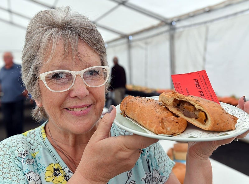 Yvonne Boyd holding a winning plate of pasties baked by Brian Gardner at the Monkton Leek, Vegetable and Floral Society show. Does this bring back memories from 2018?