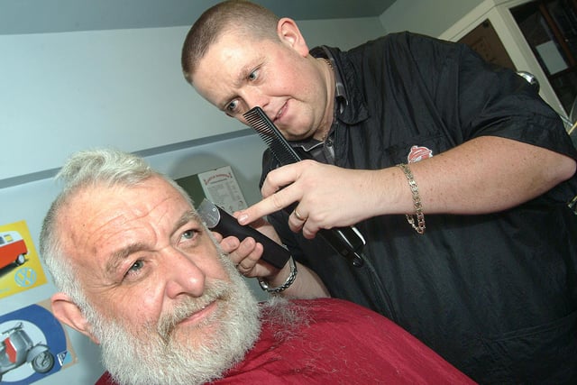Bolsover barber Mark Thompson from Castle Barbers gives Tony Jackson  a Mohican cut to raise money for the Ault Hucknall Church roof fund
