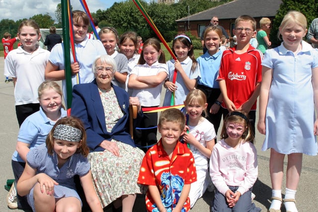 New Bolsover Primary School celebrated its centenary in 2007. The school's maypole dancers are pictured with Gladys Spencer, 95, who attended the school when she was six years old.