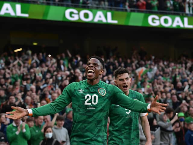 Chiedozie Ogbene of Republic of Ireland celebrates a goal with Sheffield United's John Egan in the background (Charles McQuillan/Getty Images)