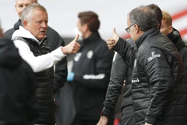 Sheffield United manager Chris Wilder and Leeds United manager Marcelo Bielsa gesture: Darren Staples/Sportimage