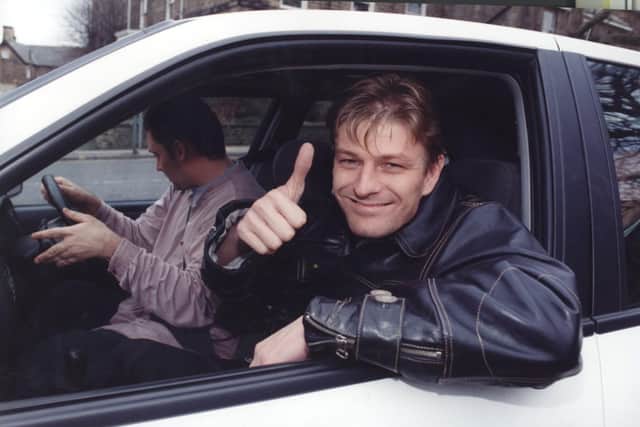 Sean Bean leaves Sheffield's Weston Park by car after being flown there by helicopter from London to continue filming in the city in 1995 (pic: Steve Ellis)