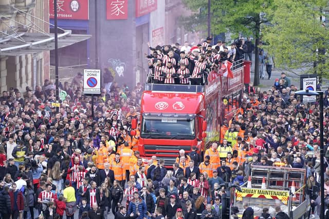 Sheffield United's players celebrate their promotion to the Premier League