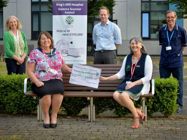 In May, Sutton's King's Mill Hospital's £450,000 gamma scanner appeal reached its target - staff are pictured, socially distanced, receiving the final donation from Jill Smallwood, Voluntary Services chairman, on behalf of Voluntary Services.
