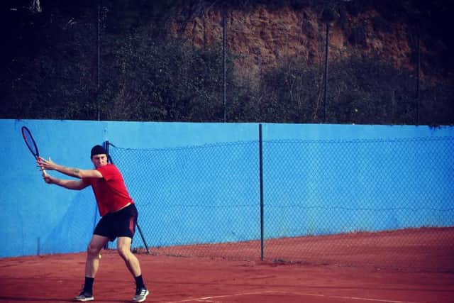 George trains full-time in Spain on the clay courts to improve his game