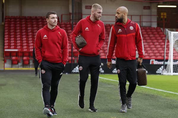 Former Rangers midfielder John Fleck and Rangers fan Oli McBurnie are two of the Sheffield United stars out of contract this summer: Simon Bellis/Sportimage