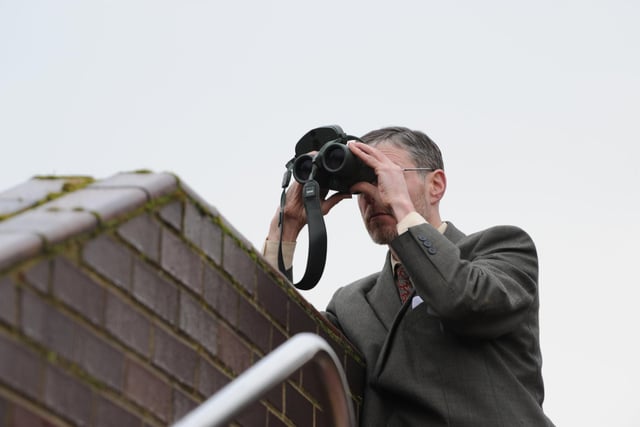 One person watched the Sunderland ceremony with binoculars to maintain social distance guidelines.