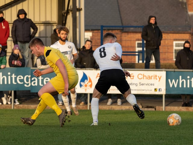 Action from Heanor Town v Selston at the Town Ground on Monday.