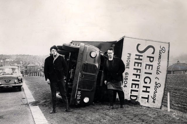 Two men escaped from their overturned lorry at Whiston, Rotherham after the February 1962 hurricane